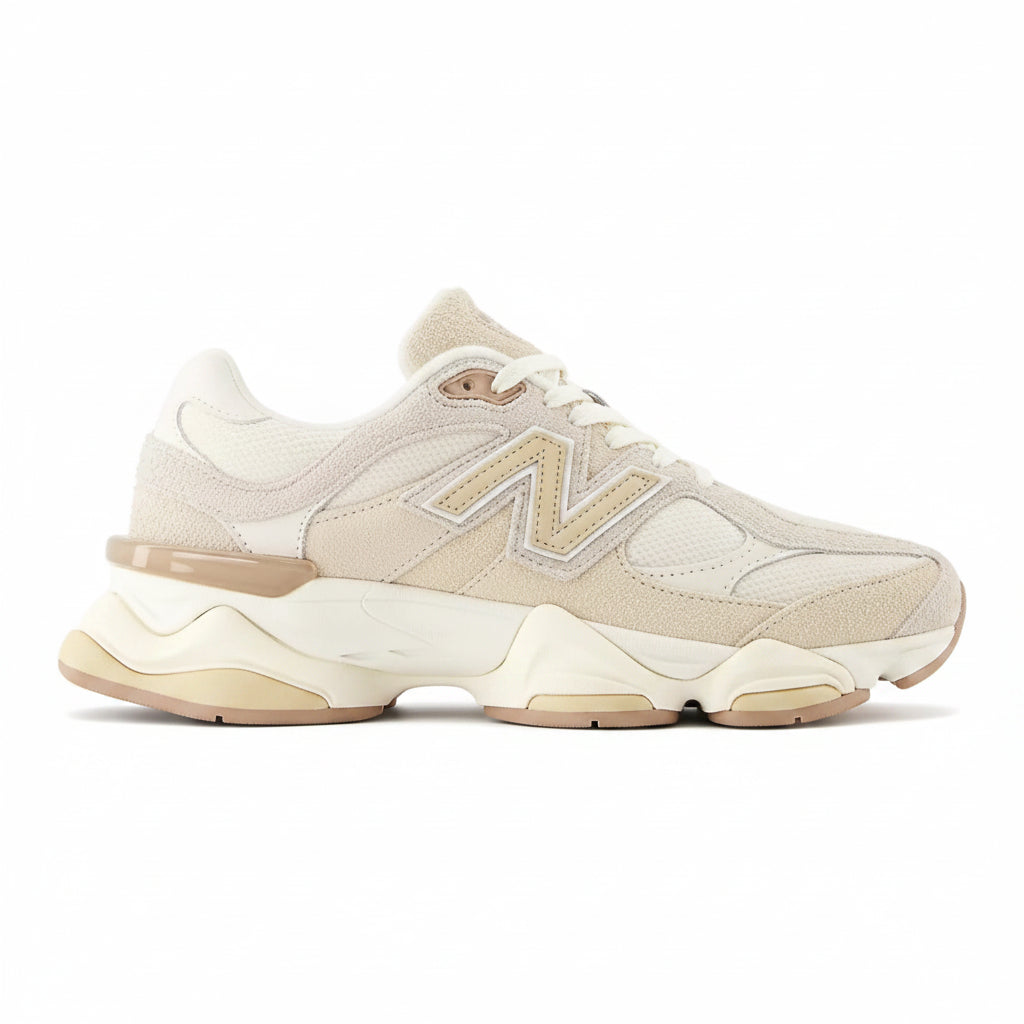 Beige sneaker with a brand logo on a white background